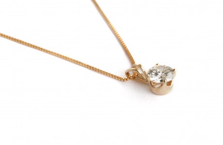 Golden chain with diamond pendant